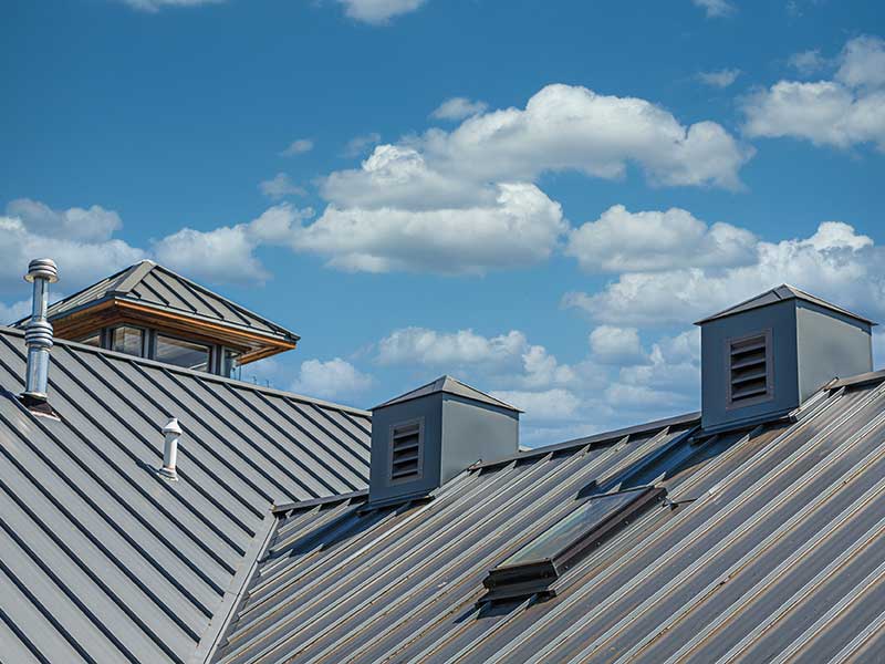 Close-up of a gray metal roof on a residential roof